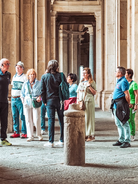 Participants on a guided tour inside the Royal Palace of Caserta, Italy.