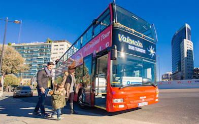 Passengers boarding the Valencia tour bus in the city center.