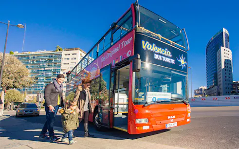 Passengers boarding the Valencia tour bus in the city center.