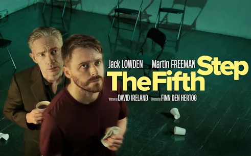 Two men holding cups in a dimly lit room with scattered chairs, promoting "The Fifth Step.
