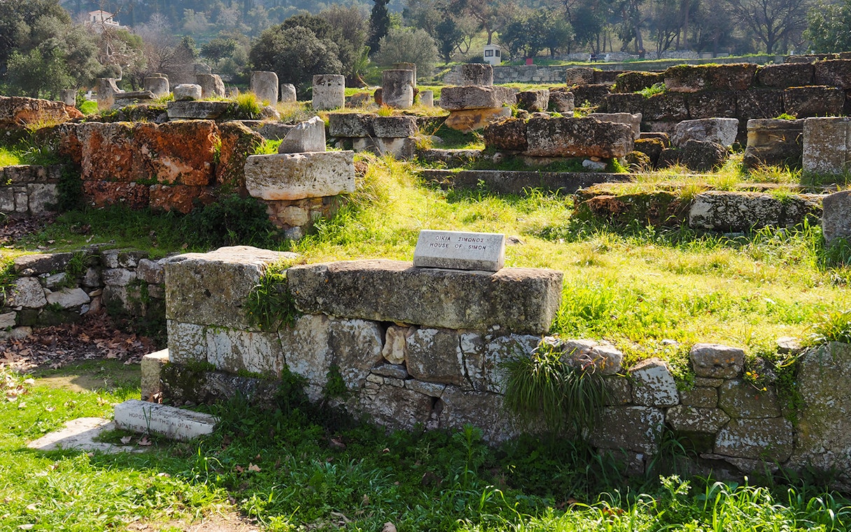 Ancient Agora ruins with "House of Simon" sign, Athens, Greece.