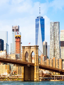 Brooklyn Bridge with Lower Manhattan skyline in New York City.