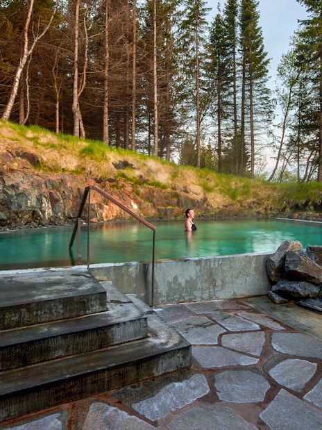 Geothermal spa in Vaðlaskógur forest near Akureyri, North Iceland.