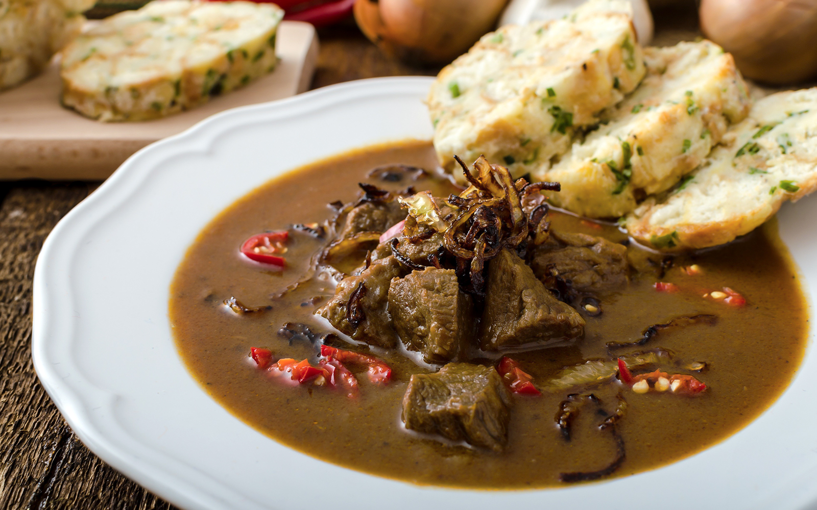 Traditional Czech goulash with dumplings served in Prague.