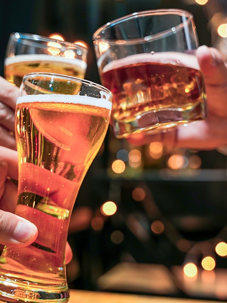 Glasses of beer and alcohol being cheered on a cruise.
