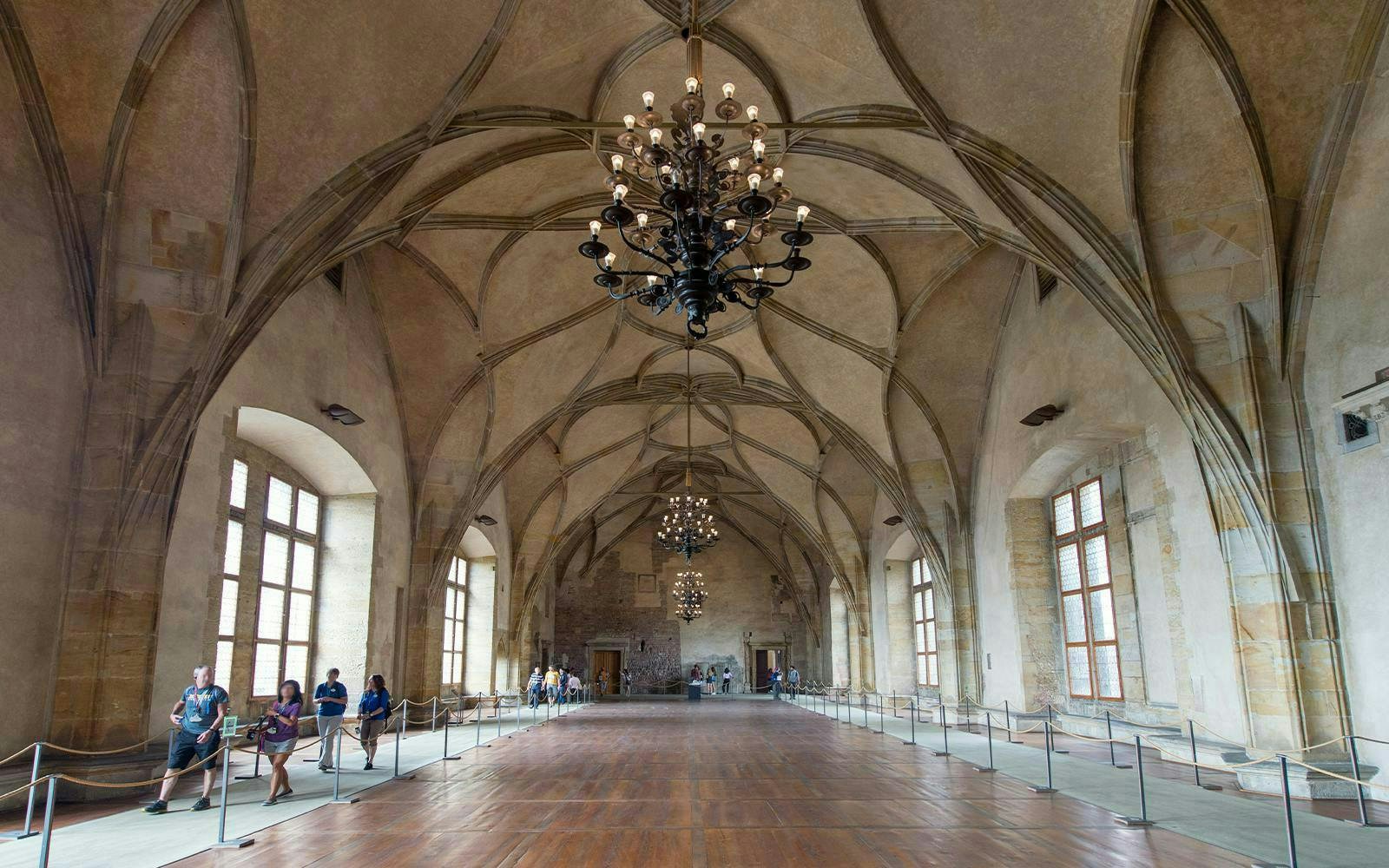 Vladislav Hall interior with vaulted ceilings and chandeliers, Prague Castle, Czech Republic.