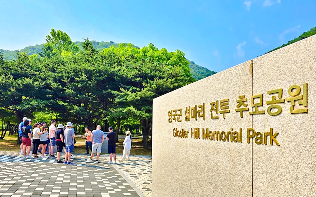 Tour group at Gloster Hill Memorial Park, Seoul to DMZ tour, South Korea.