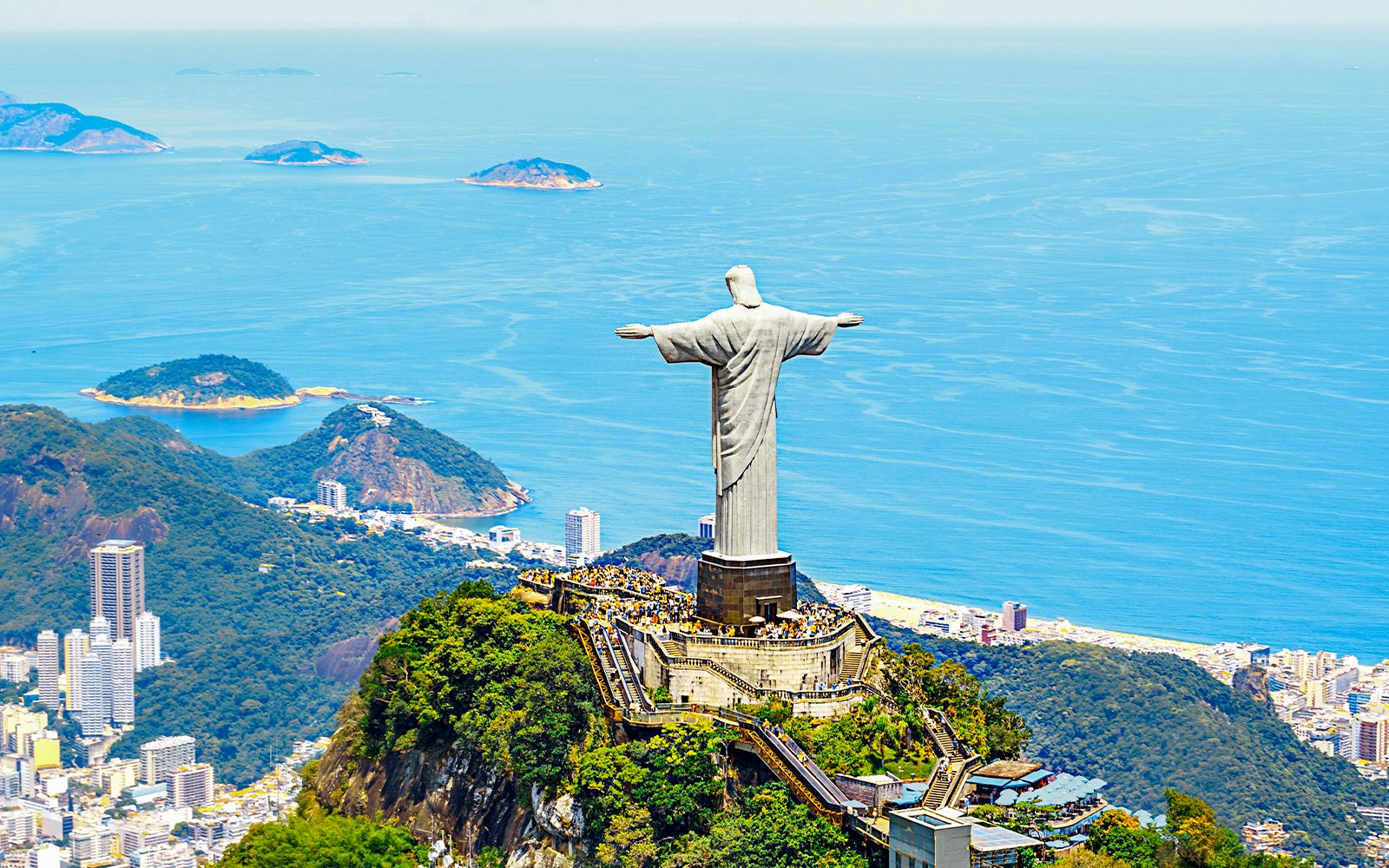 Christ the Redeemer statue overlooking Rio de Janeiro and the Atlantic Ocean.
