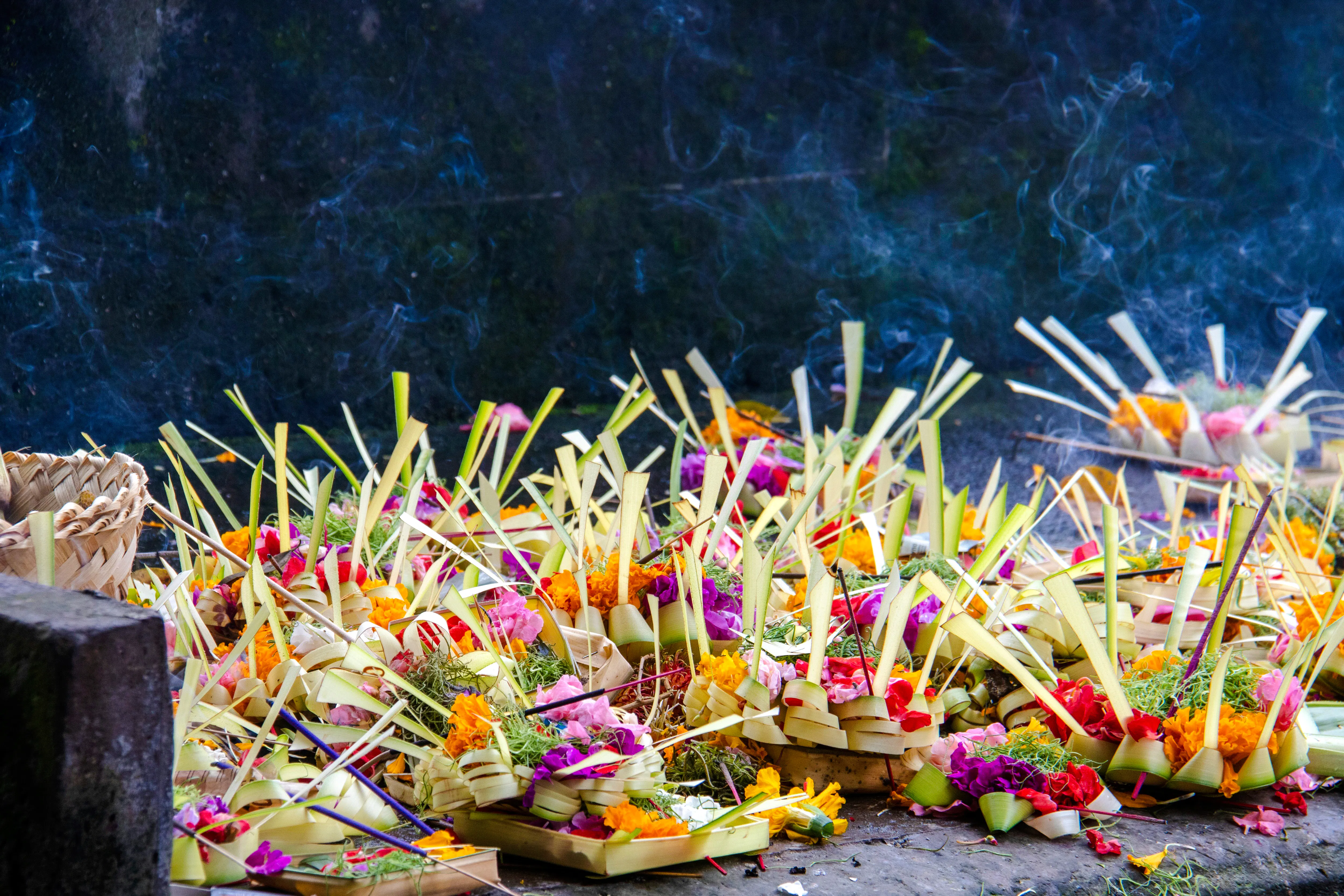 Balinese offerings at Tirta Empul Temple, Bali, for water purification ritual.