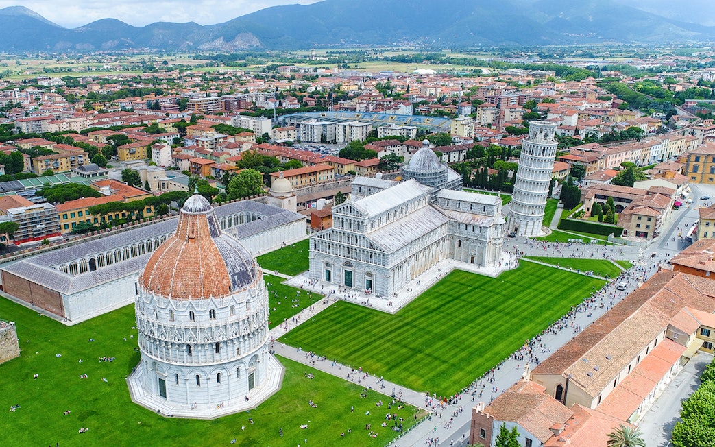 Aerial view of Piazza dei Miracoli in Pisa with the Leaning Tower, Cathedral, and Baptistery.