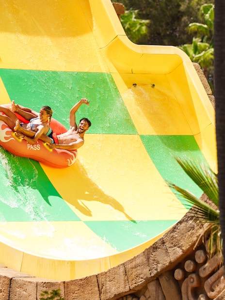 Riders enjoying the Tsunami ride at Aqualand El Arenal.