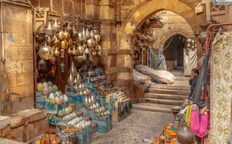 Lanterns and colorful goods displayed at a shop in Khan El Khalili market, Cairo.