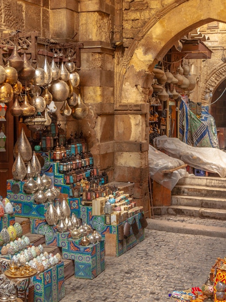 Lanterns and colorful goods displayed at a shop in Khan El Khalili market, Cairo.