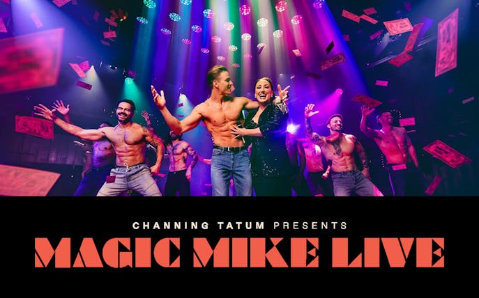 Performers on stage at Magic Mike Live show with colorful lights and confetti.