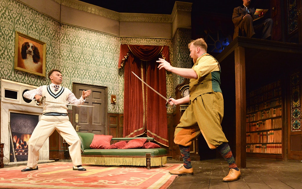 Actors in a comedic sword fight on stage during "The Play That Goes Wrong.