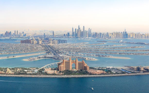 Aerial view of Palm Jumeirah and Atlantis Hotel in Dubai, showcasing Adventure Zone Watersports.