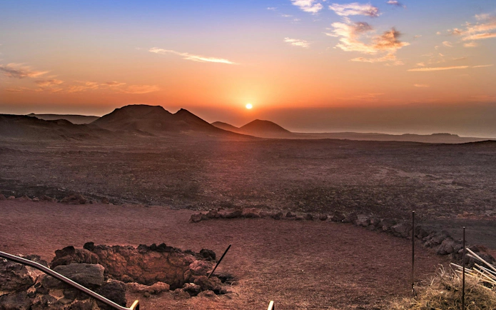 Sunset over volcanic landscape at Timanfaya National Park, Lanzarote.