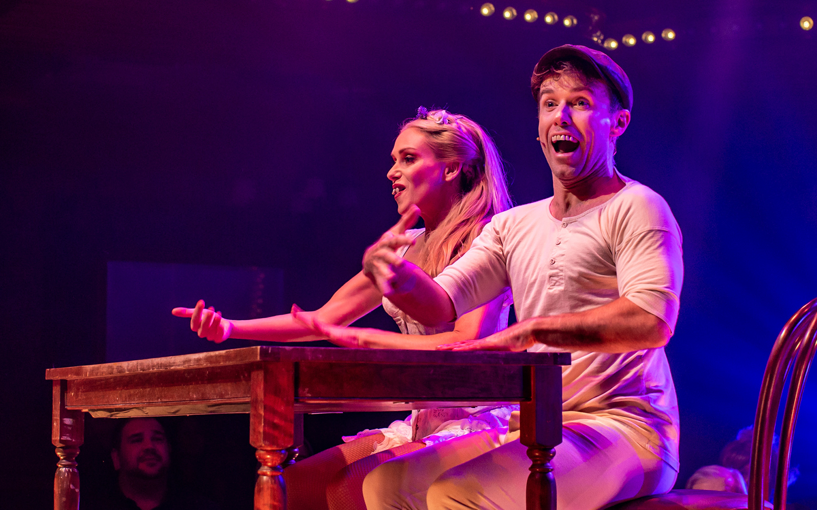 Performers at a table during the Atomic Saloon Show in Las Vegas.