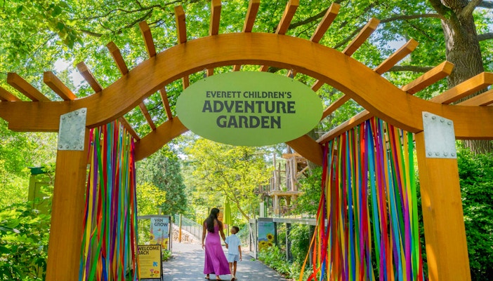 Entrance to Everett Children’s Adventure Garden at NYBG with colorful ribbons.