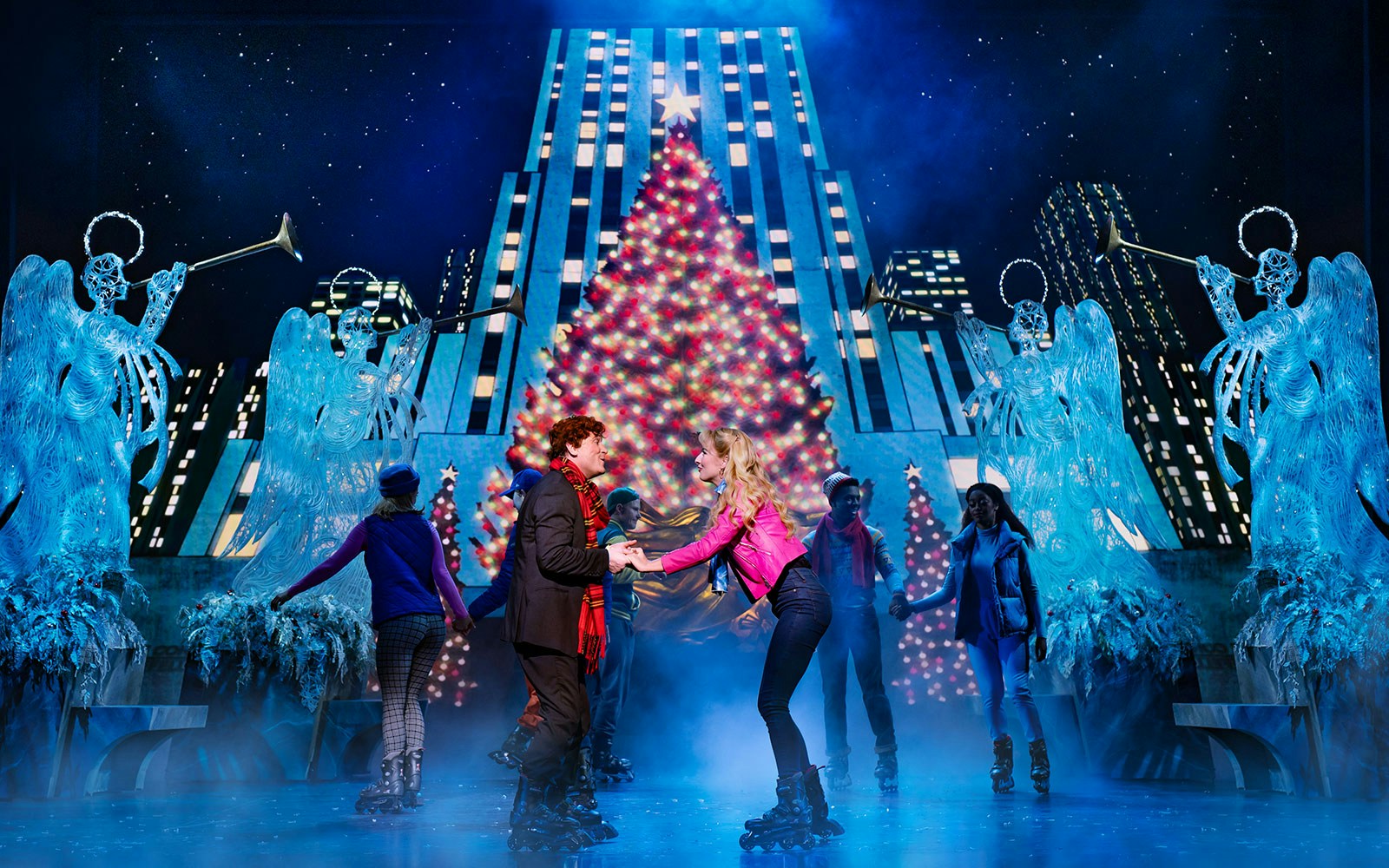 Elf The Musical stage performance with actors in festive costumes, New York City theater.