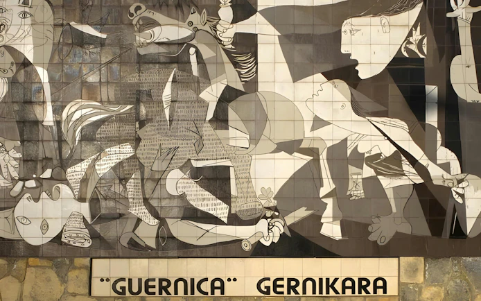 Pablo Picasso's Guernica mural depicting war chaos and suffering.