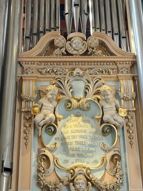 Blenheim Palace organ pipes and ornate carvings in the interior.