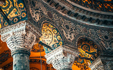 Hagia Sophia interior with ornate columns and intricate mosaics, Istanbul, Turkey.