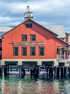 Boston Tea Party Ships & Museum red building on waterfront, Boston.