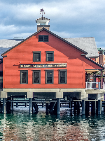 Boston Tea Party Ships & Museum red building on waterfront, Boston.