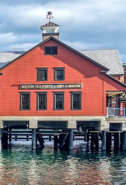 Boston Tea Party Ships & Museum red building on waterfront, Boston.