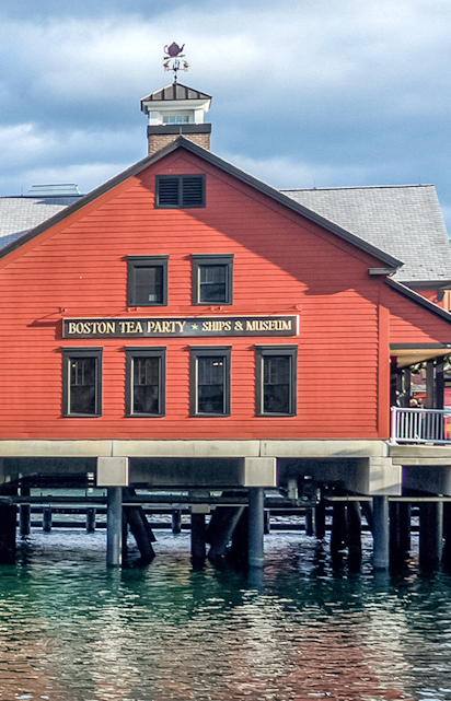 Boston Tea Party Ships & Museum red building on waterfront, Boston.