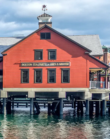 Boston Tea Party Ships & Museum red building on waterfront, Boston.