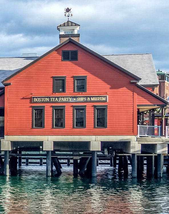 Boston Tea Party Ships & Museum red building on waterfront, Boston.