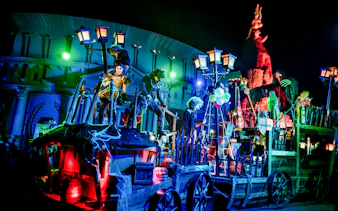 Parc Asterix Halloween parade with performers in costumes, Paris, France.