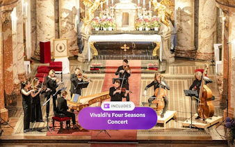 Musicians performing Vivaldi's Four Seasons in an ornate concert hall.