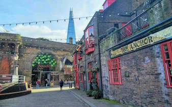 Southwark street view with The Shard and The Anchor pub, part of London exploration game.