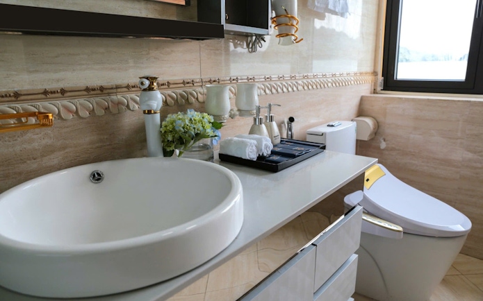 Luxurious bathroom on Lan Ha Bay 3-4 star cruise with modern amenities.