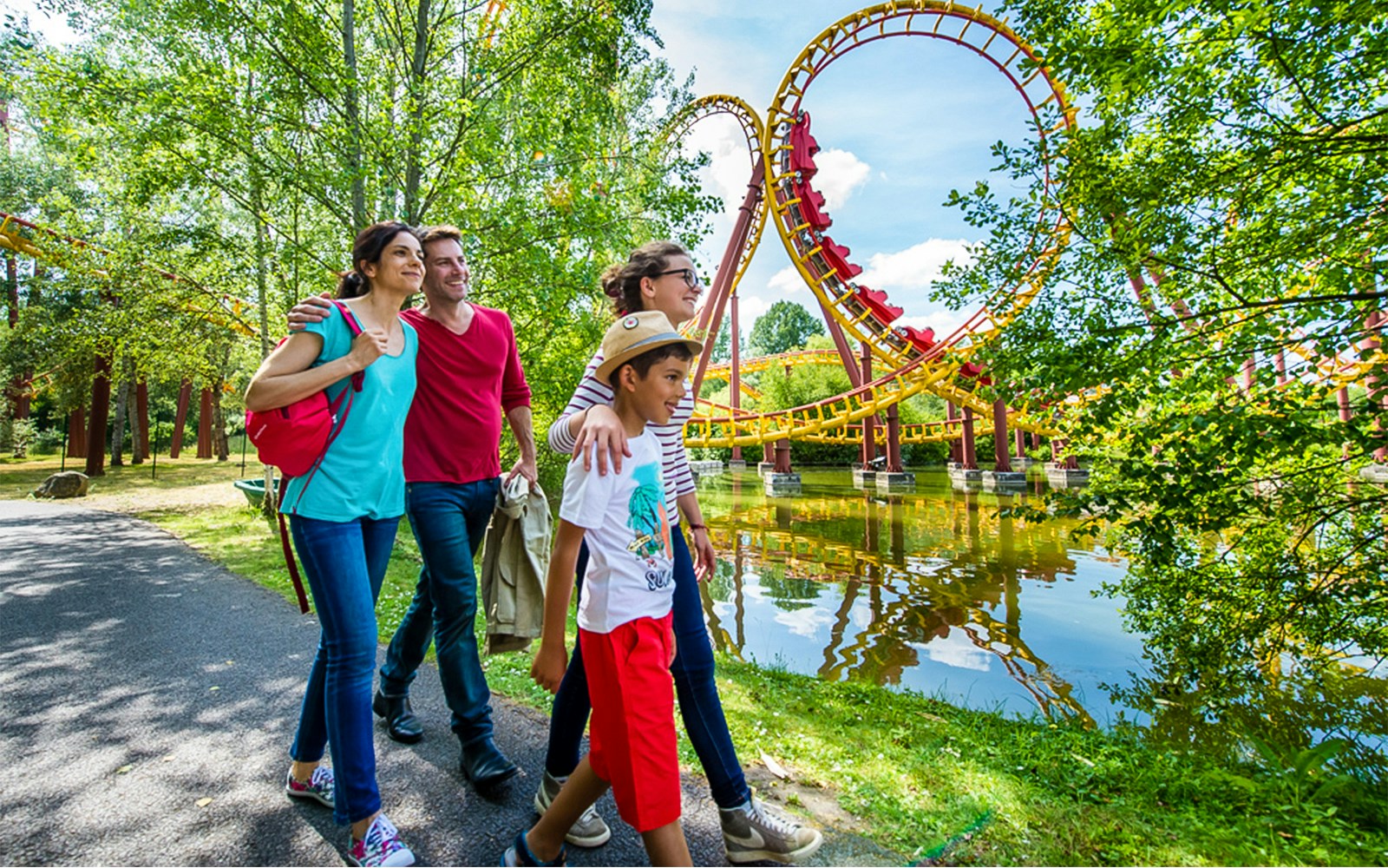 Roller coaster at Parc Asterix, France, with passengers enjoying a thrilling ride.