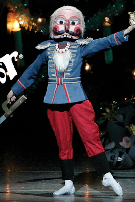 Nutcracker character on stage at New York City Ballet's The Nutcracker performance.