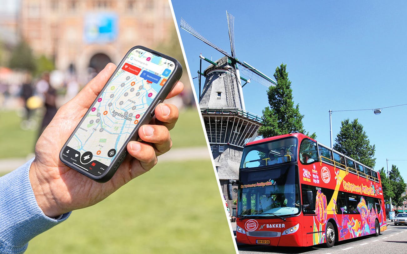 Hand holding a smartphone with Amsterdam map app, next to a red double-decker tour bus and windmill.