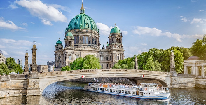 Berlin cityscape featuring the Berlin TV Tower and surrounding architecture.