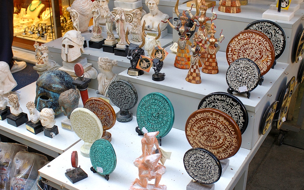 Ancient artifacts and replicas at a market near Knossos Palace, Crete.