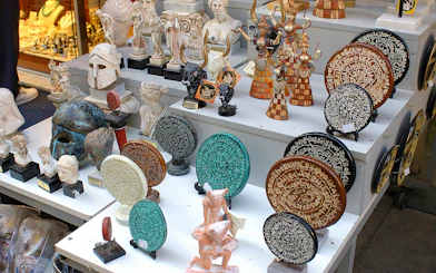 Ancient artifacts and replicas at a market near Knossos Palace, Crete.