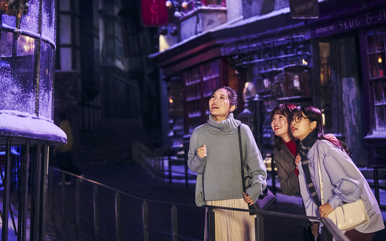 Visitors enjoying Diagon Alley at Christmas during The Making of Harry Potter Studio Tour in Tokyo.