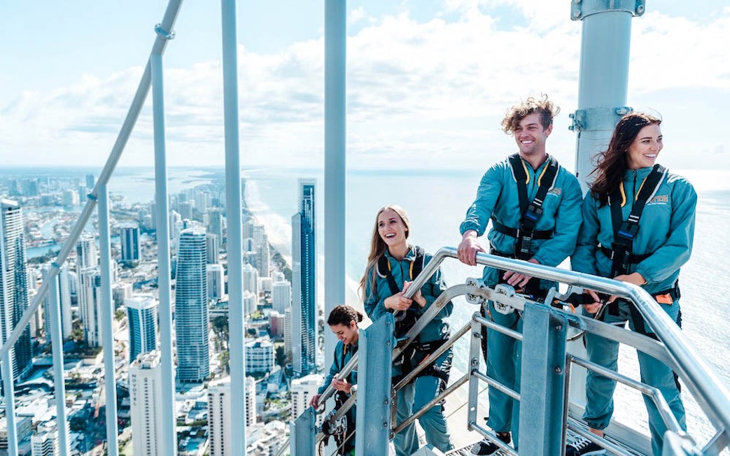 Guests at the top of Skypoint Climb with Gold Coast skyline in the background.