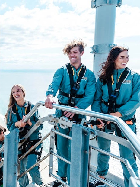 Guests at the top of Skypoint Climb with Gold Coast skyline in the background.