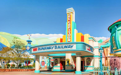 Runaway Railway entrance at Disneyland Park, California, featuring colorful art deco design.