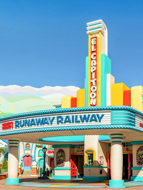 Runaway Railway entrance at Disneyland Park, California, featuring colorful art deco design.