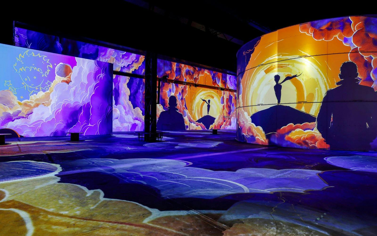 Immersive digital art projections inside Phoenix des Lumières art center.