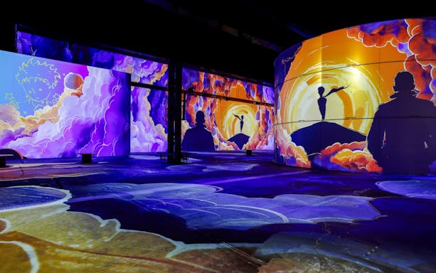 Immersive digital art projections inside Phoenix des Lumières art center.